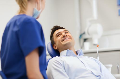 man at the dentist for a tooth extraction
